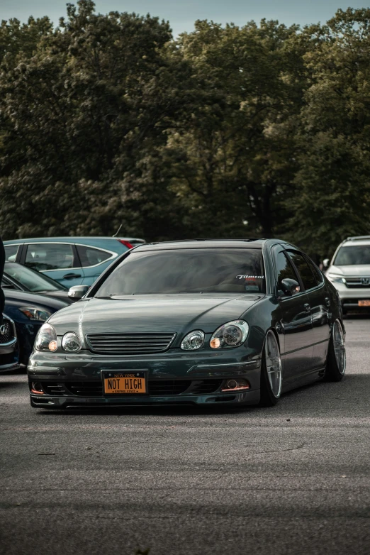 two cars parked side by side on a parking lot