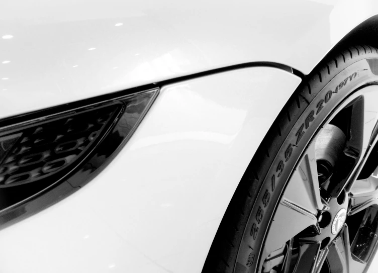 front tire view of a white sports car