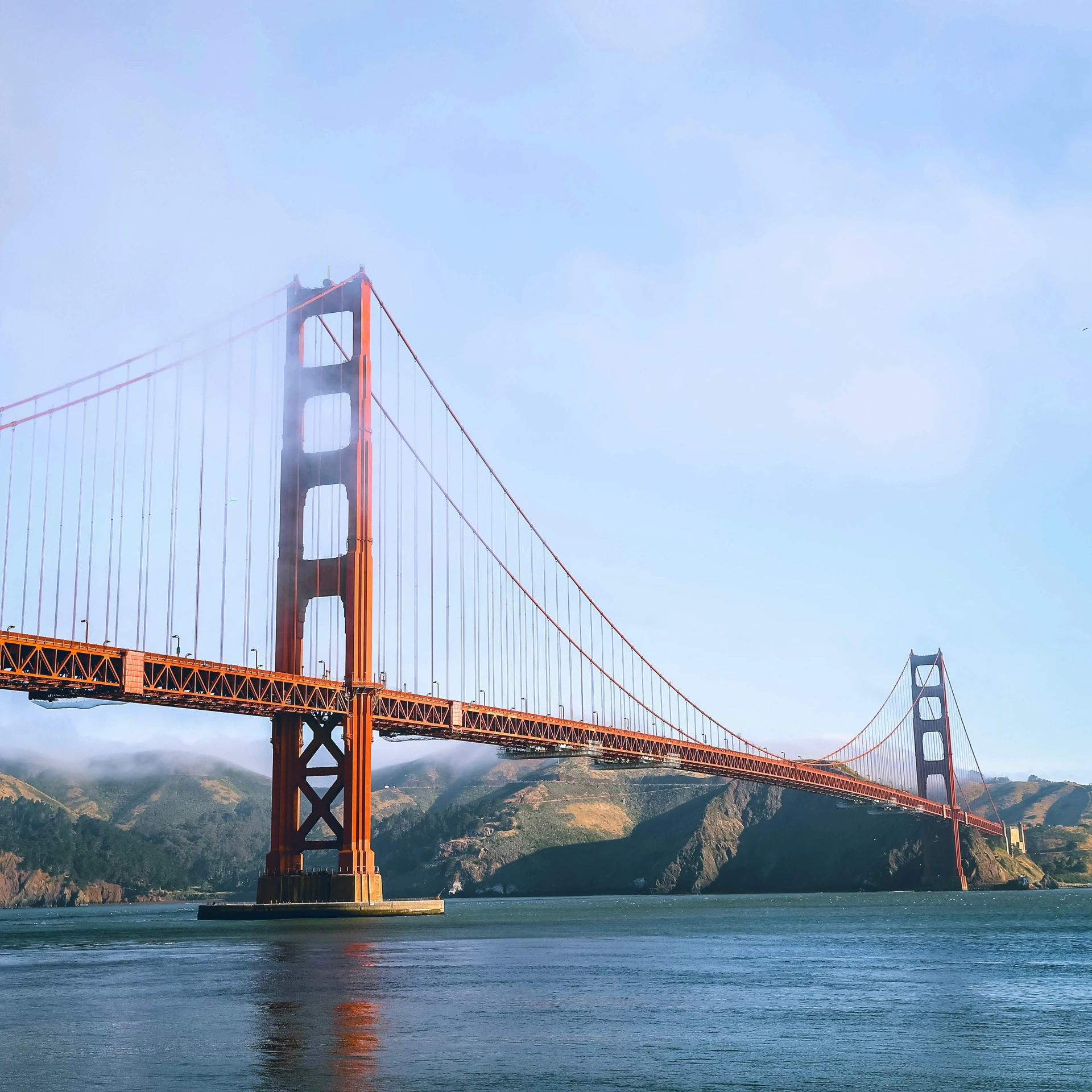 a large bridge spanning over a wide body of water