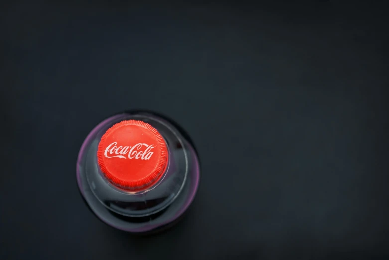 a coca cola bottle is shown in this close up s