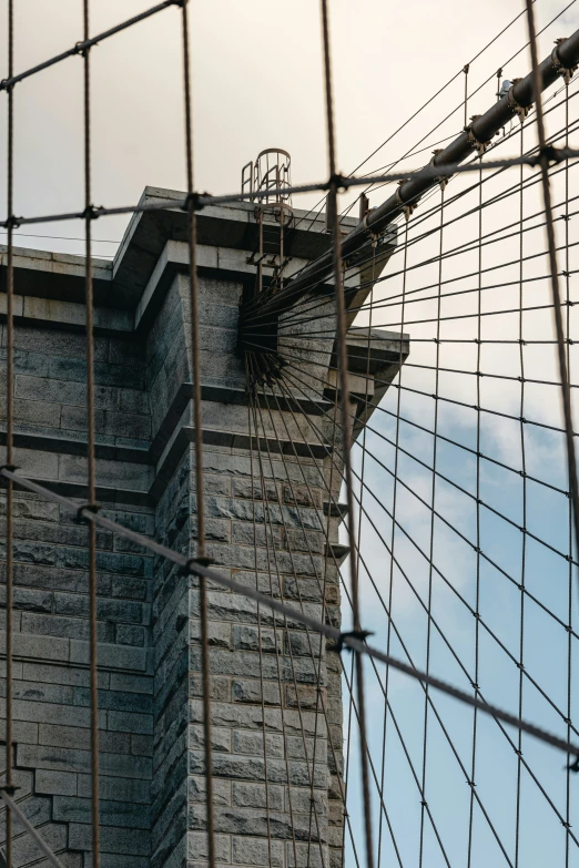 the side view of a tower made out of barbed wire