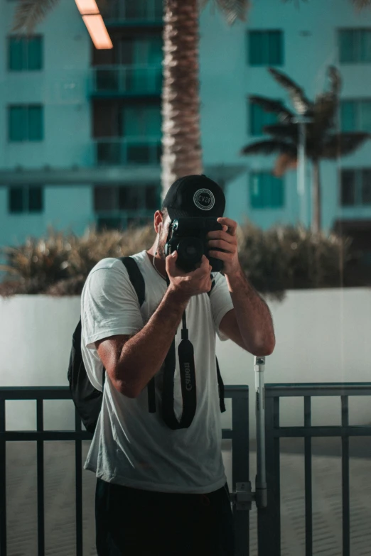 a man taking a picture with his camera
