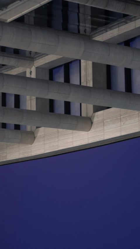 underside s of a building with concrete arches