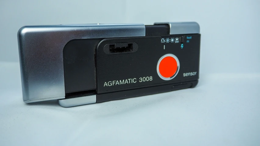 an electronic camera is shown with a red circle
