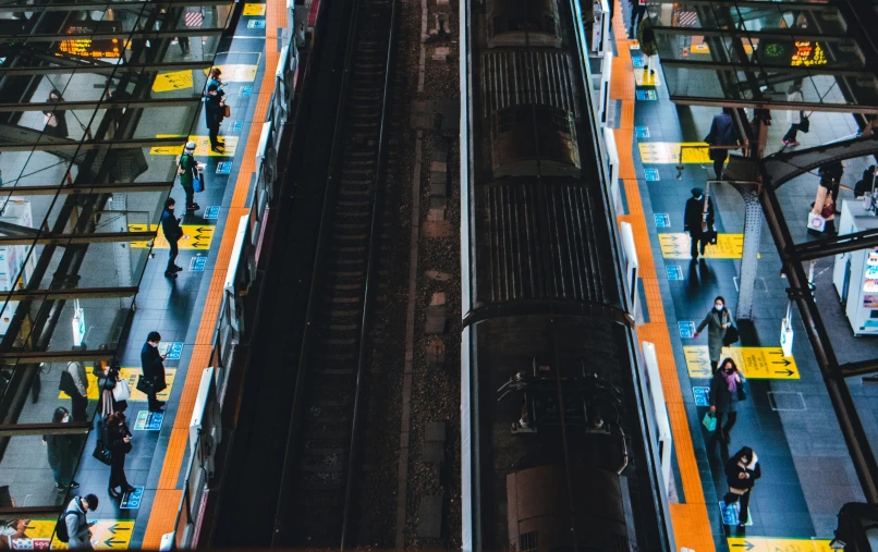 the overhead view of a train station showing train platform