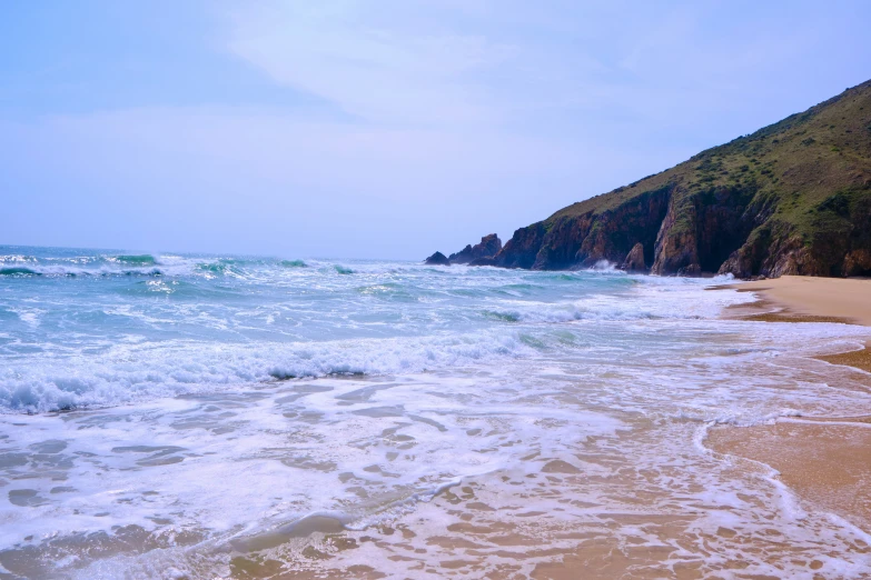 the surf at a beach is really choppy