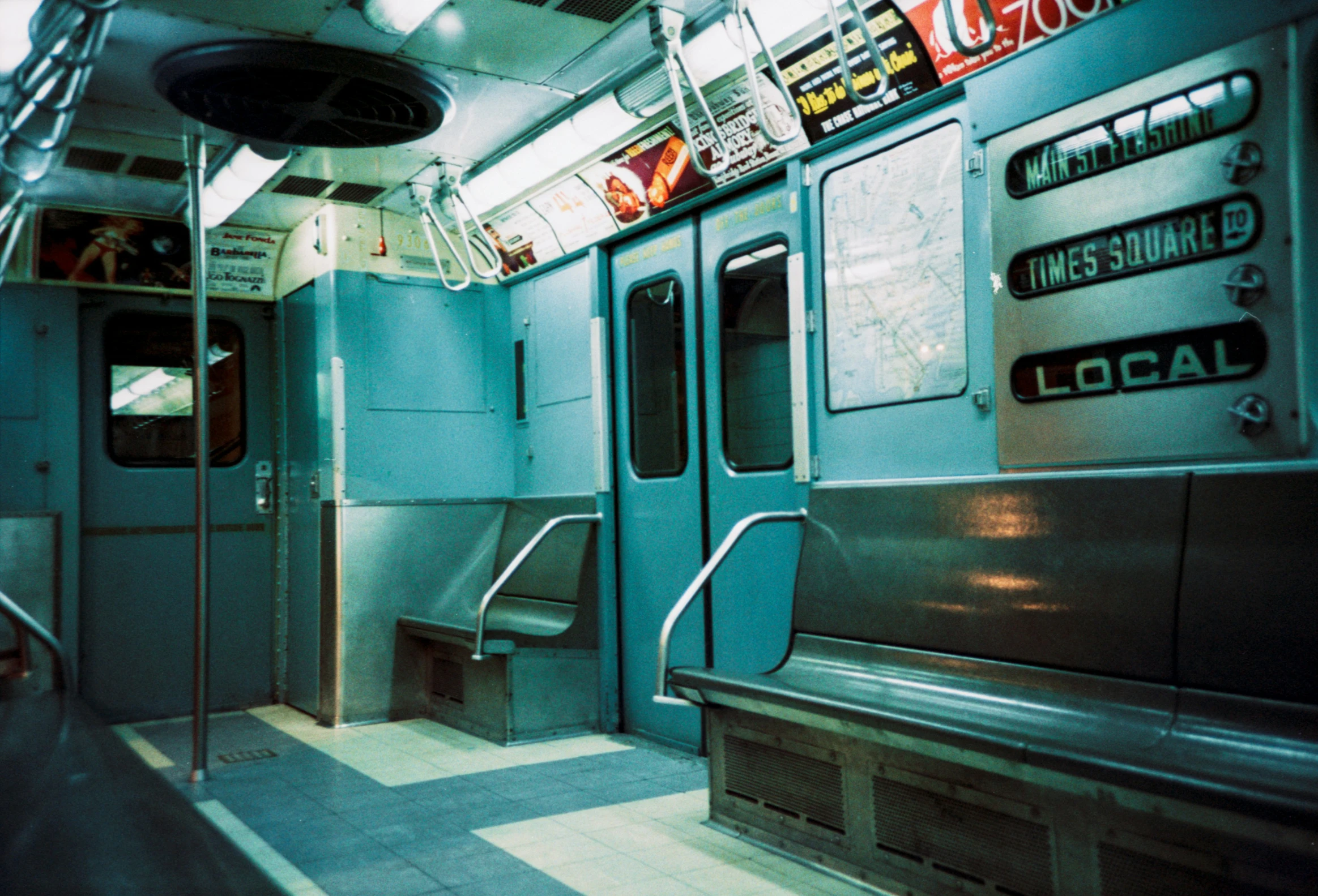 a train with seats and doors that are closed