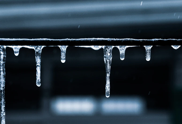 icicles in the rain and the roof outside