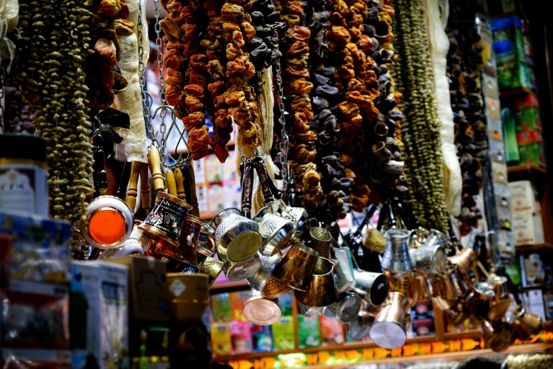 various jewelry hanging from a rack on a street