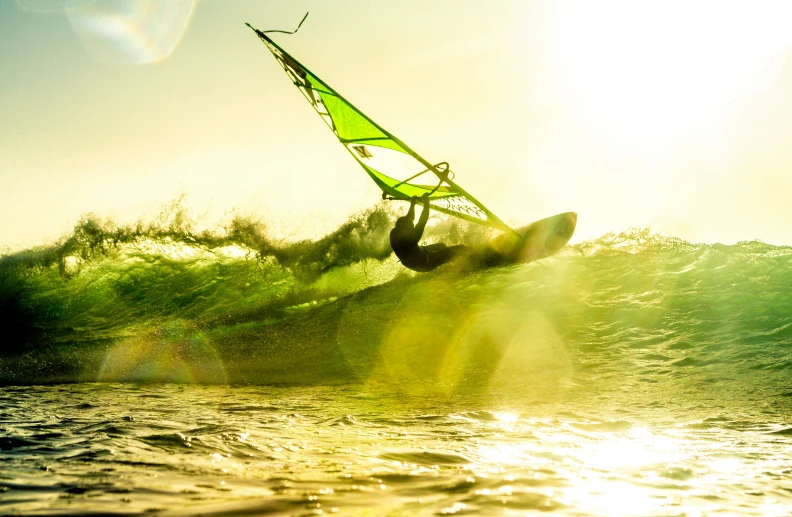 there is a person windsurfing in the water