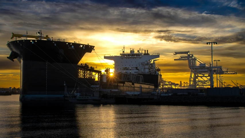 ships sit at the dock in the water