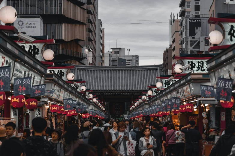 the walkway of an asian market on a cloudy day