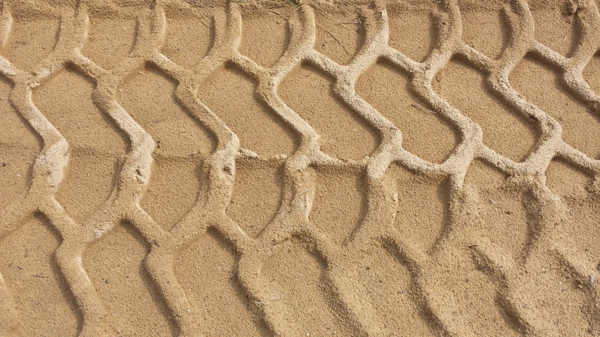 there are footprints that are on the sand