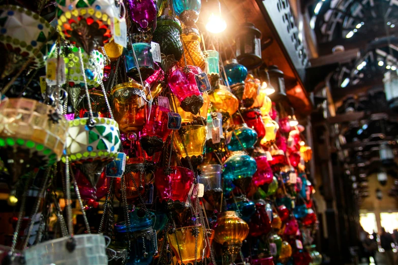 glass ornaments are hung in a room together