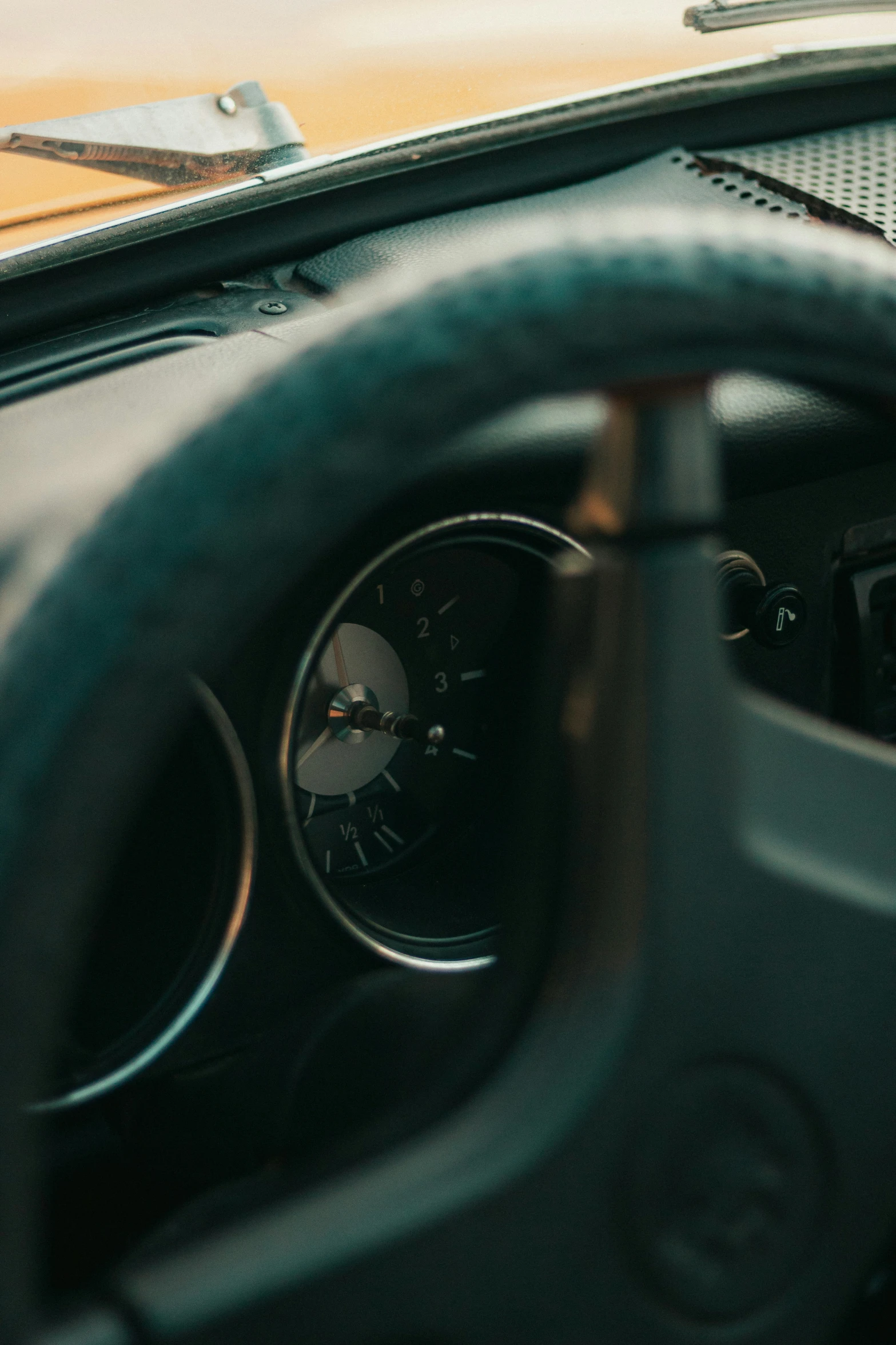 a view of a dashboard in a car with a key board and control panel