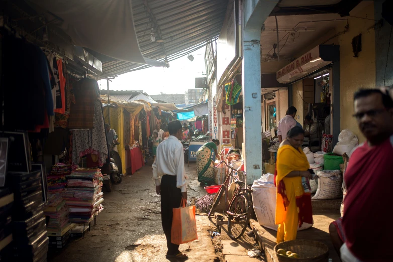 a busy city street filled with lots of shops