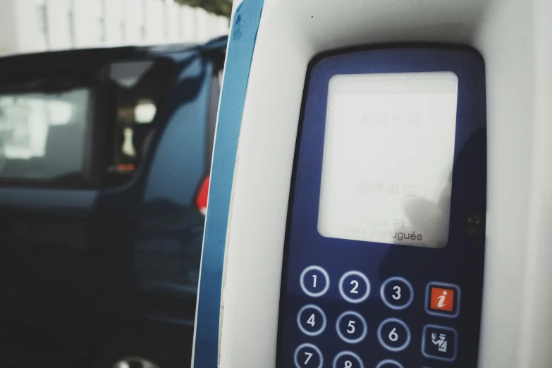 a phone hooked up to a car that is stopped