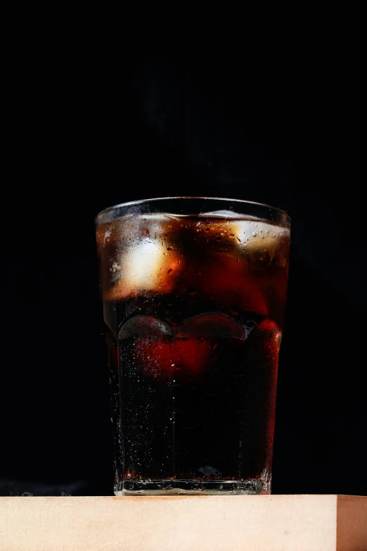 a drink in a glass is placed on a table