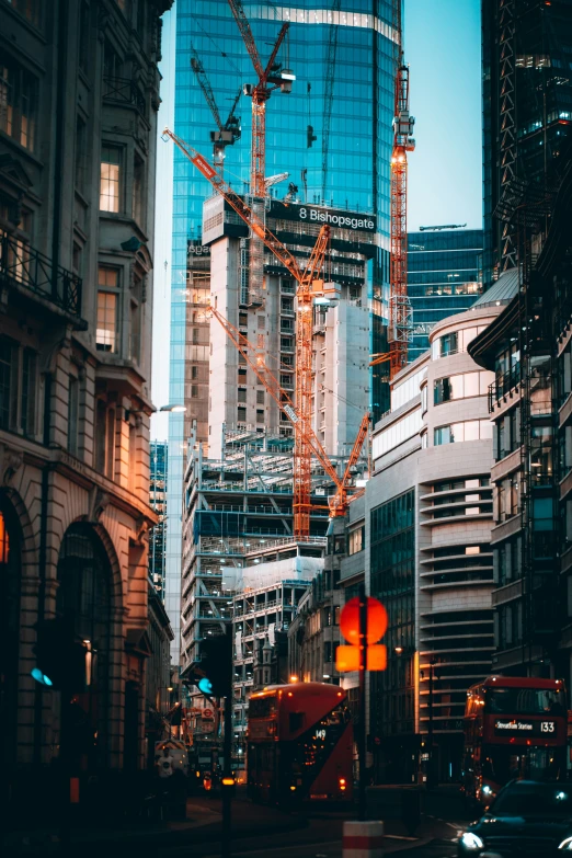 a city street with traffic lights and tall buildings