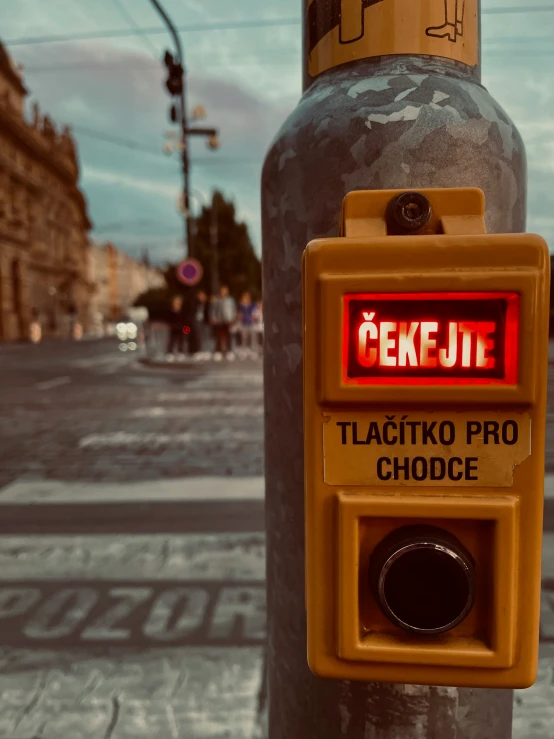a yellow light switch showing the date that is called kekele
