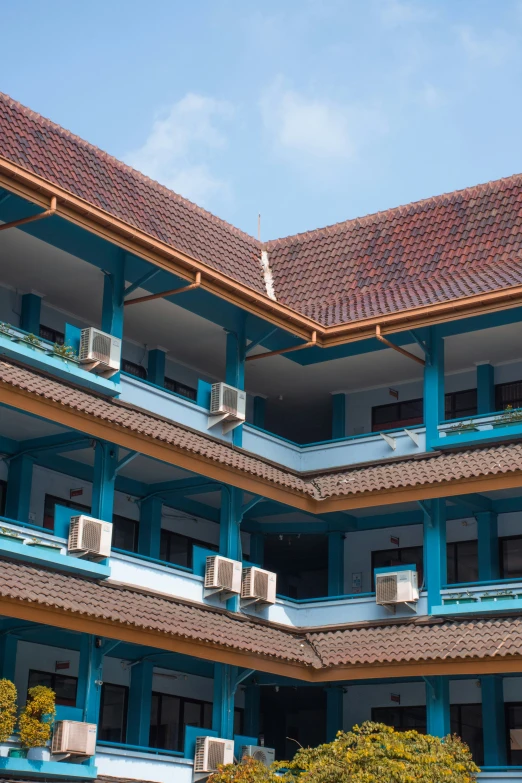 a row of buildings with some windows in front