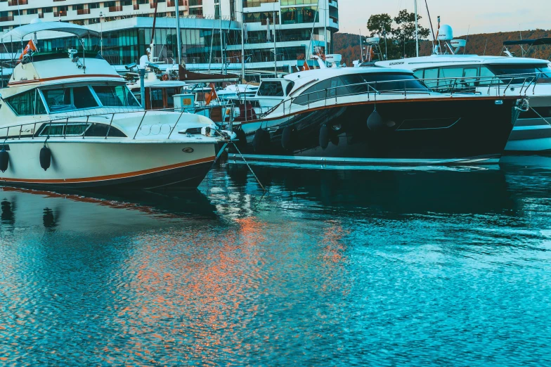 a marina with several large boats parked next to each other