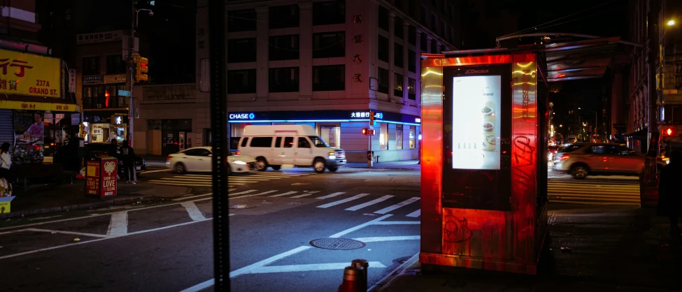 a billboard in the middle of a street