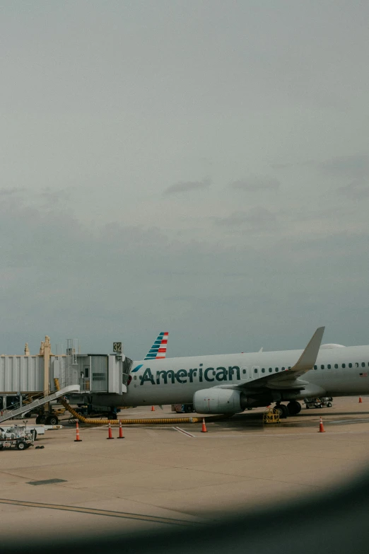 an american airlines airplane parked at the gate
