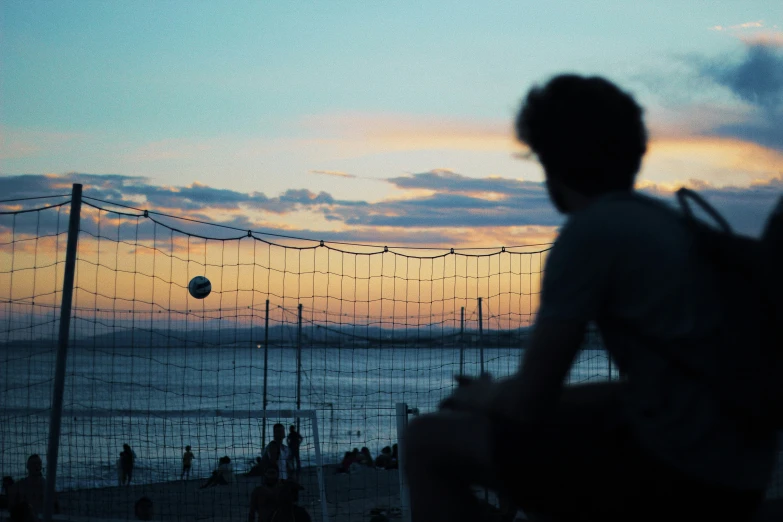 a view from a distance that looks like an evening at the beach