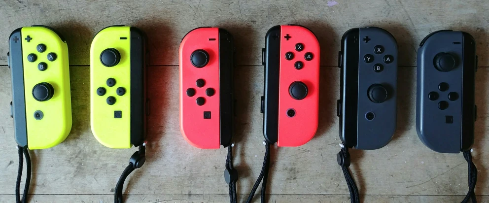 four different styles of nintendo wii controllers
