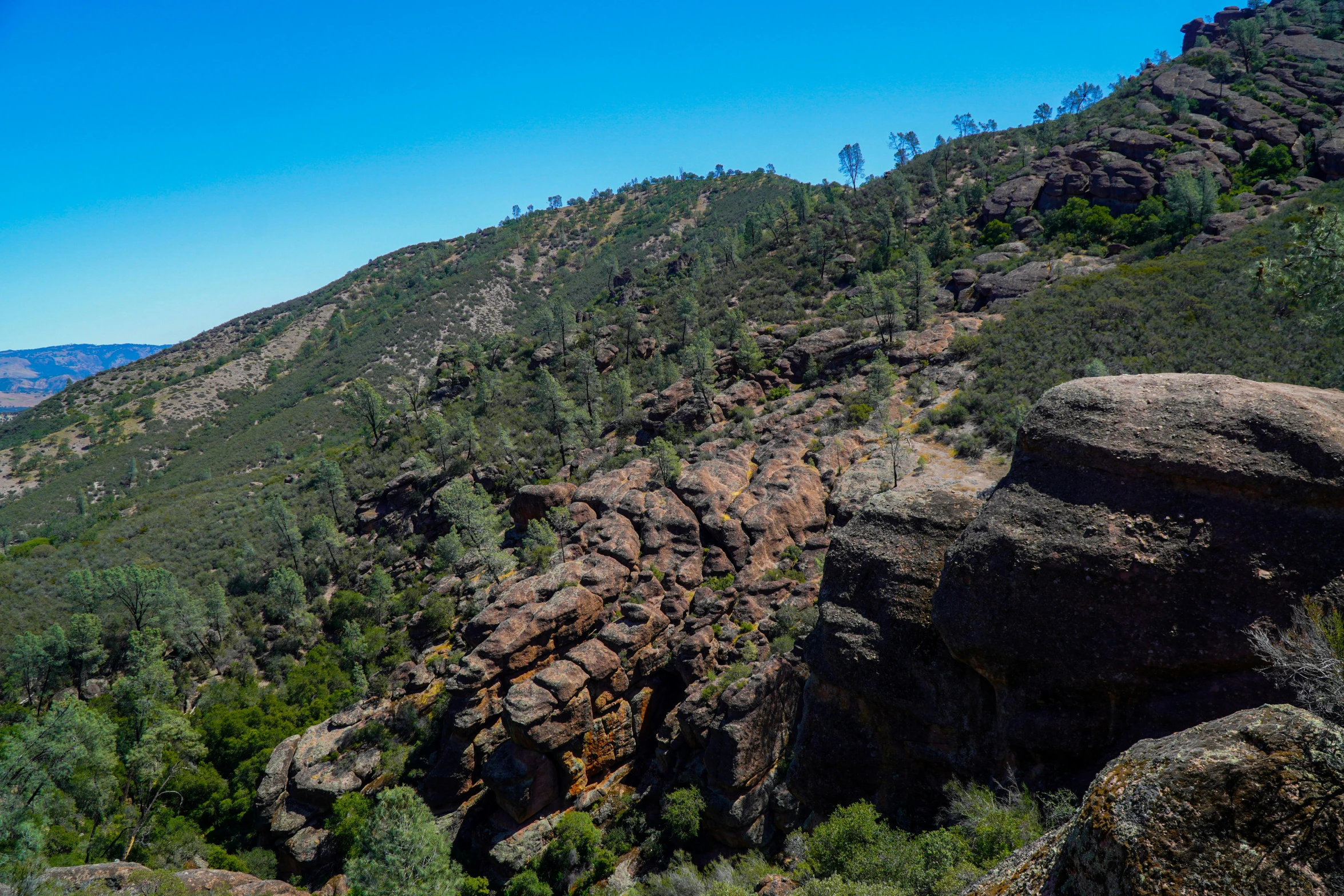 the view looking down at a very steep cliff