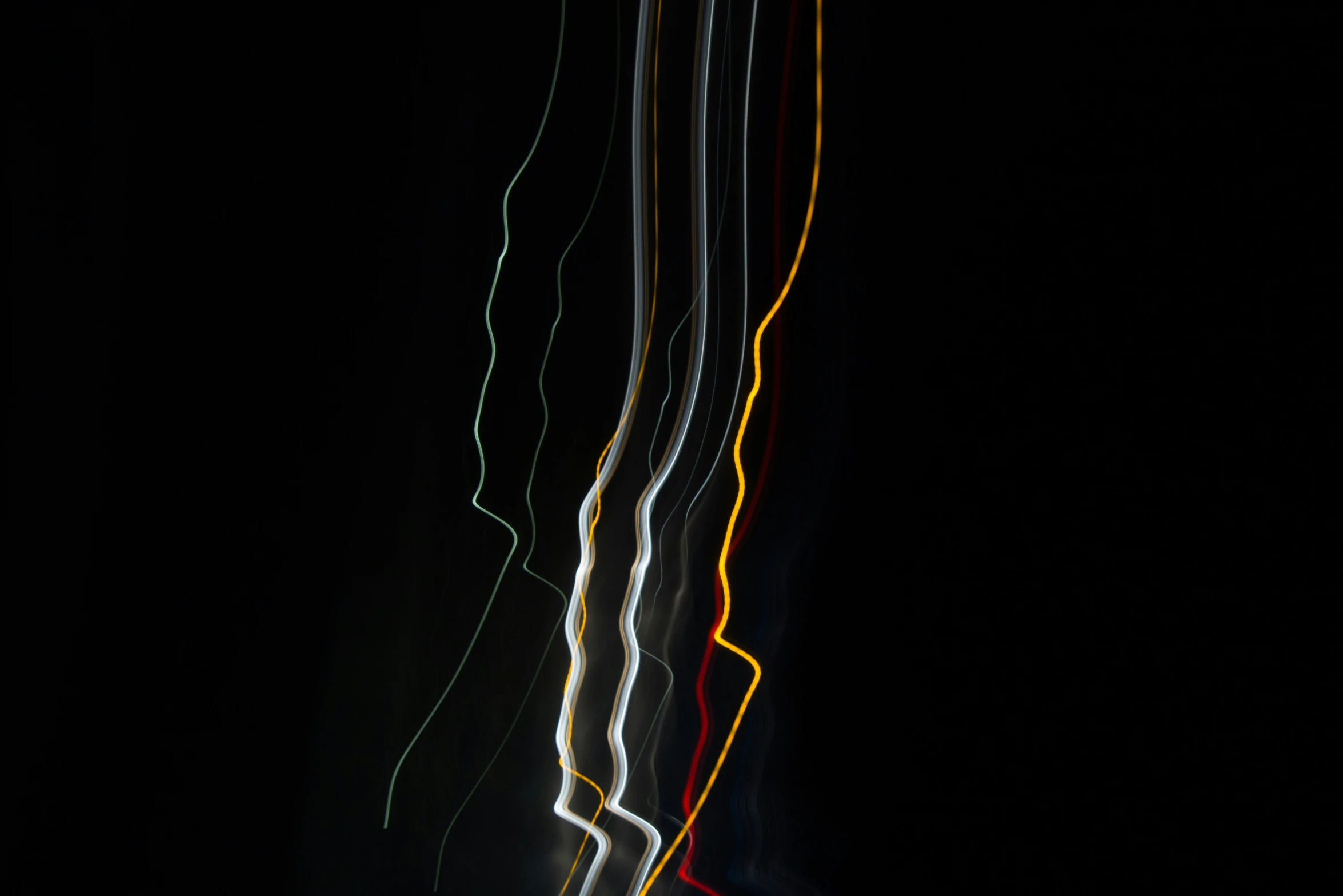 a black background with several lines of different color