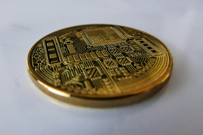 this is a coin with electronic circuit board on the front