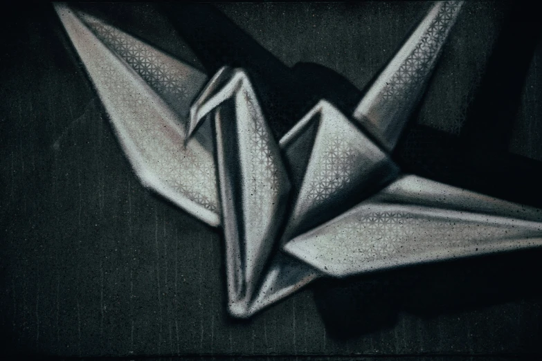 a black and white po of an origami