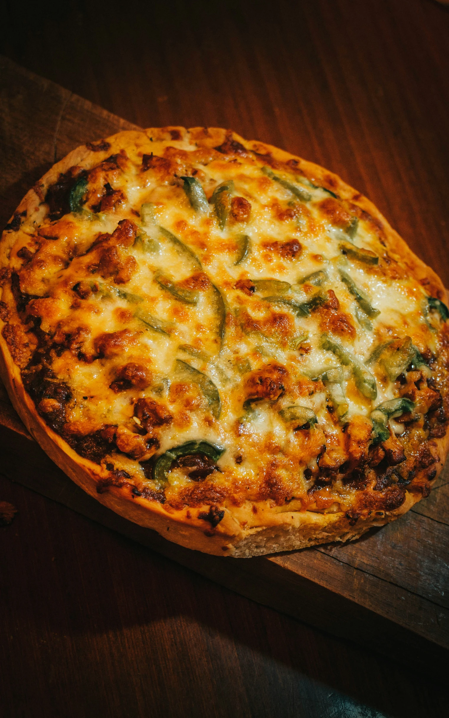 a baked pizza sitting on top of a table