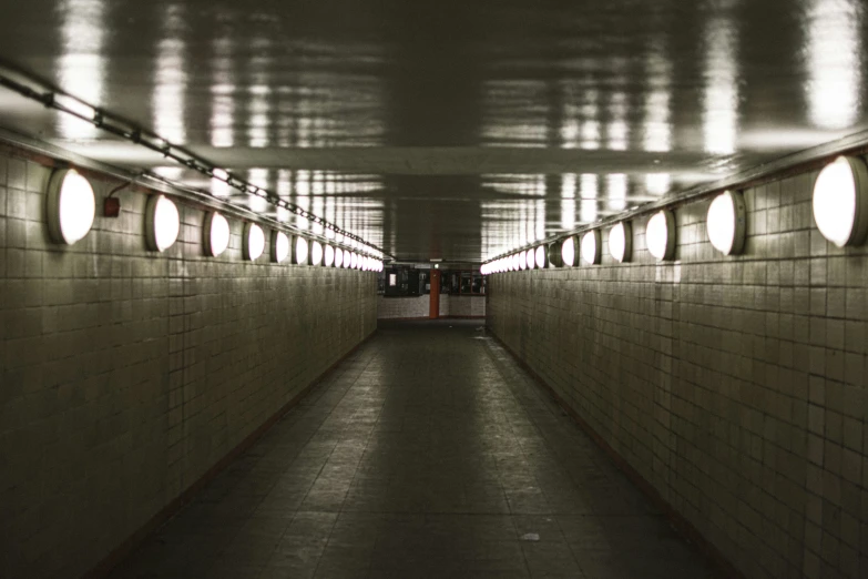 this is a tunnel in the subway with round windows