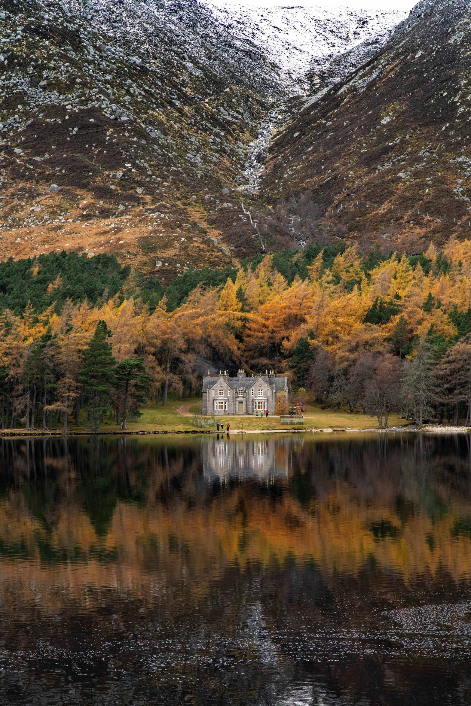 the small house is in the middle of a body of water