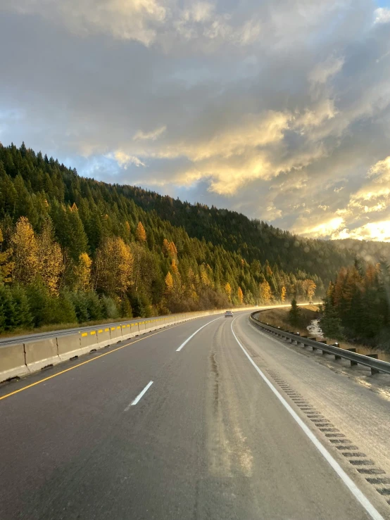 the highway is empty as it approaches the camera