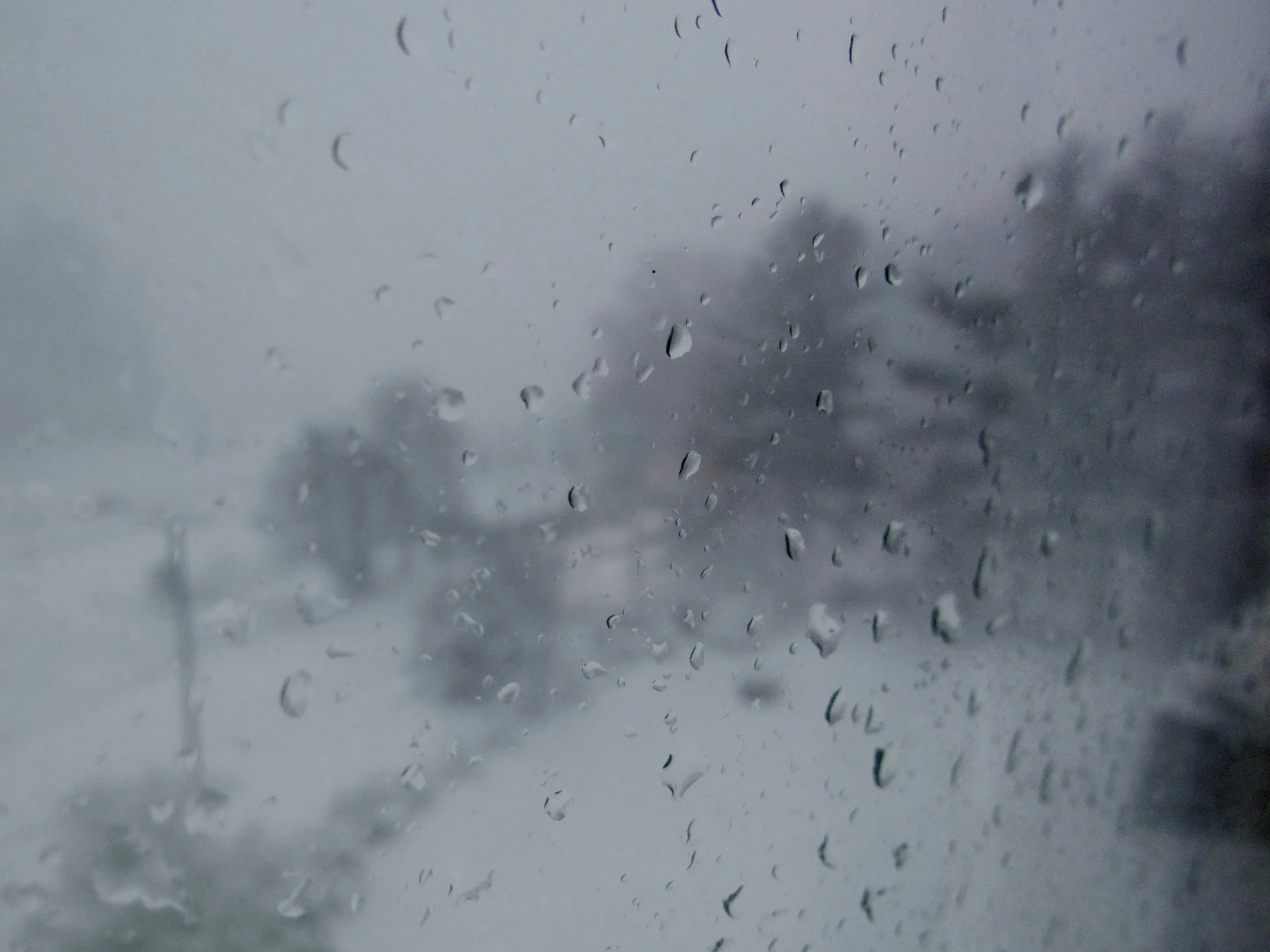 a view from inside a car of an icy street