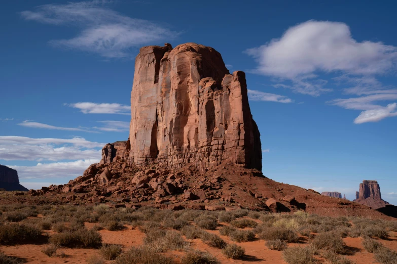 some very large stone pillars in the middle of some desert