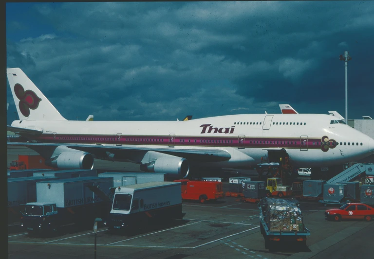 the red and white jet airliner is pulled up