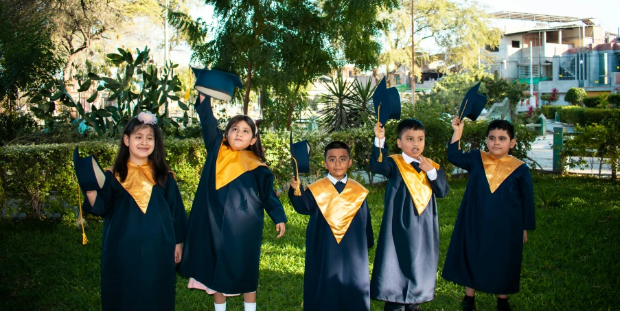 a group of s wearing graduation caps and gowns