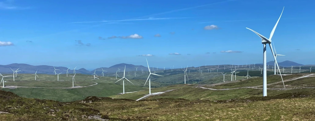 wind farm with multiple wind generators in the foreground