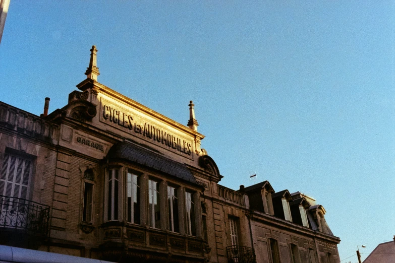 the building's steeple is tall and made of stone