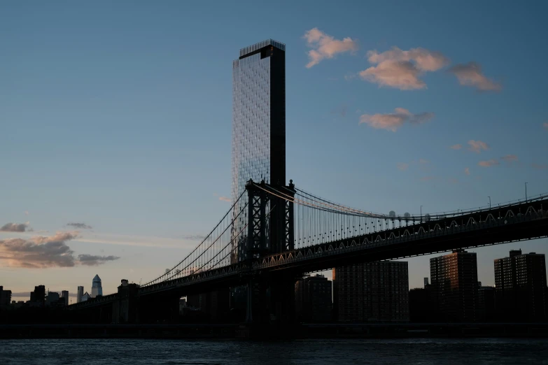 a large bridge spanning the width of the city