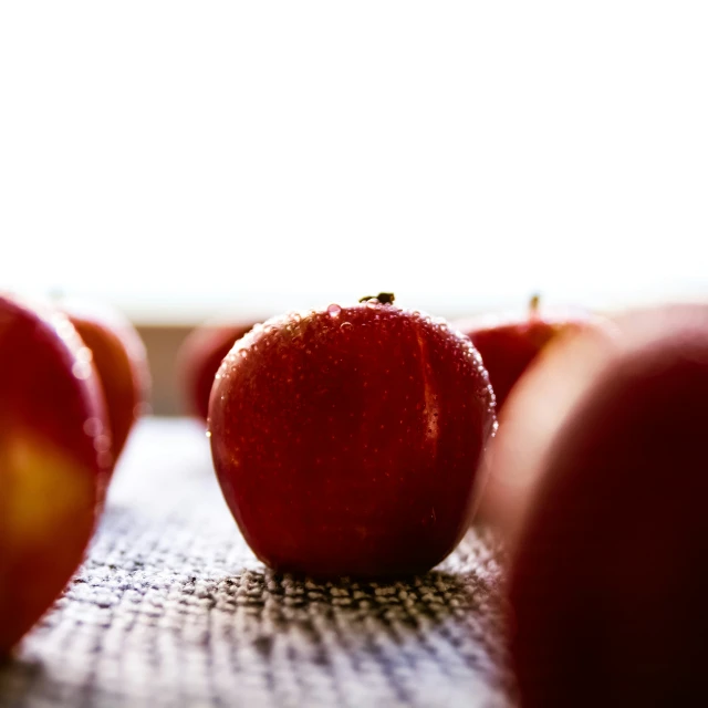 an apple with some skin that has been cut off