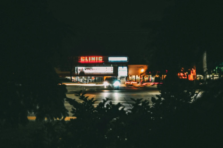 the dark po shows the buildings and trees in front of them