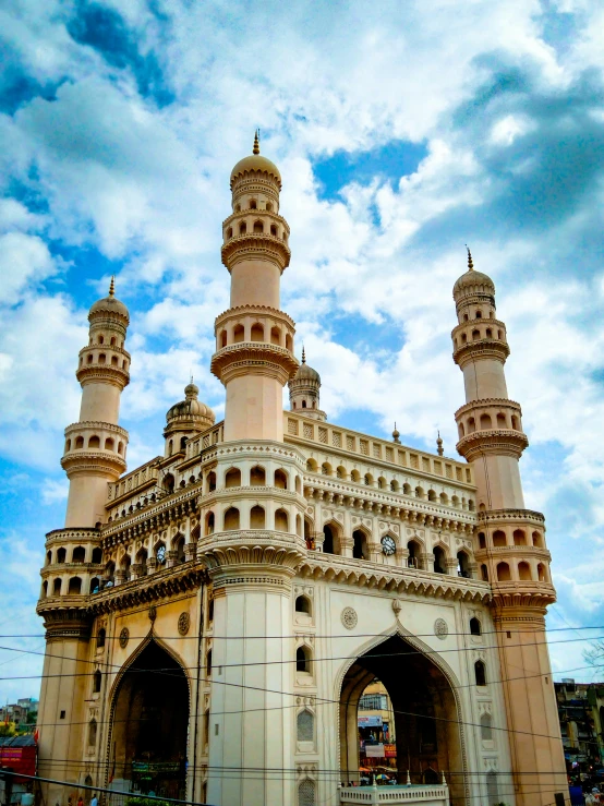 a very tall building with two towers on top