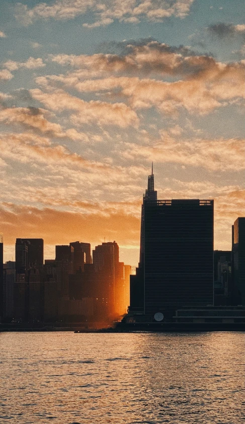 a city and its surrounding buildings at dusk