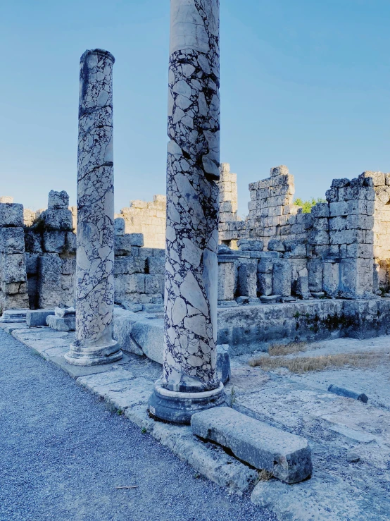 columns in ancient ruins in an outdoor setting